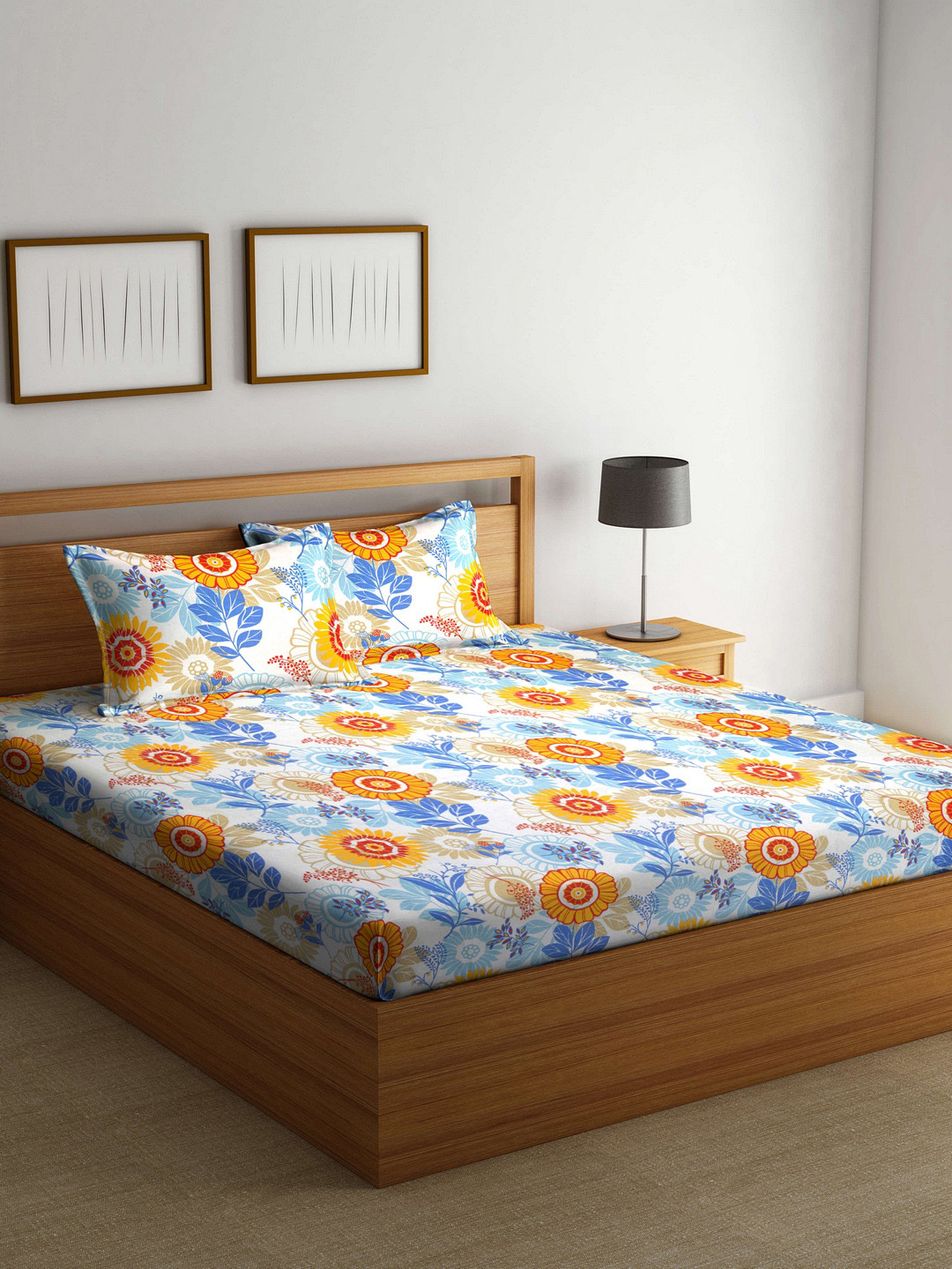 Buy BOMBAY DYEING Yellow & Blue Floral Flat 144 TC Cotton King Bedsheet
