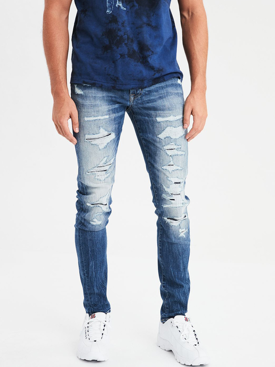 Buy AMERICAN EAGLE OUTFITTERS Men Blue Skinny Fit Mid Rise Highly Distressed Jeans - Jeans for 