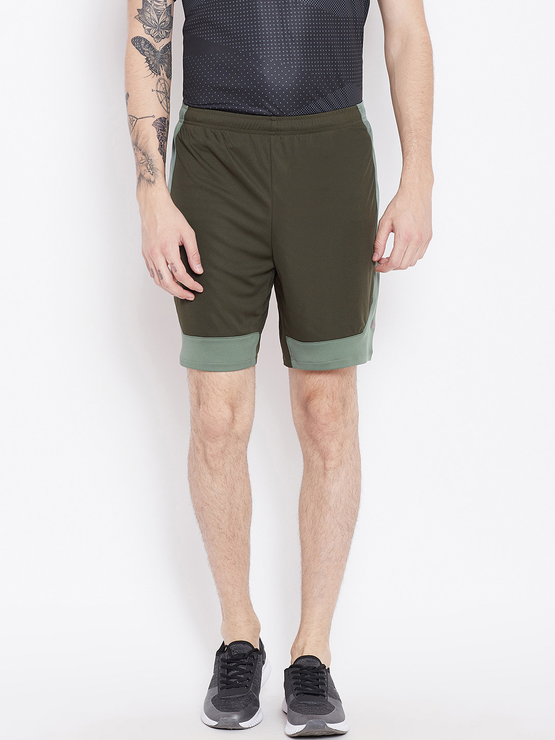 Buy Puma Men Olive Green Solid Regular FTBLNXT Training Shorts Shorts