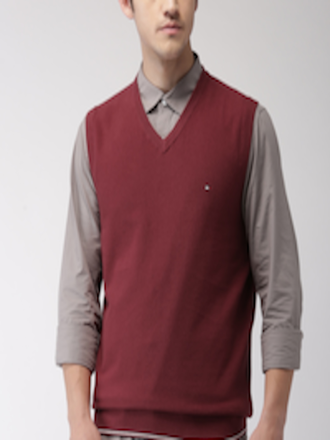 Buy Tommy Hilfiger Men Maroon Solid Sweater Vest - Sweaters for Men ...
