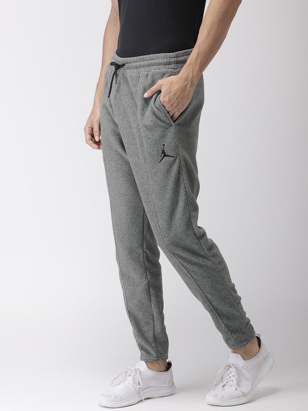 nike therma track pants