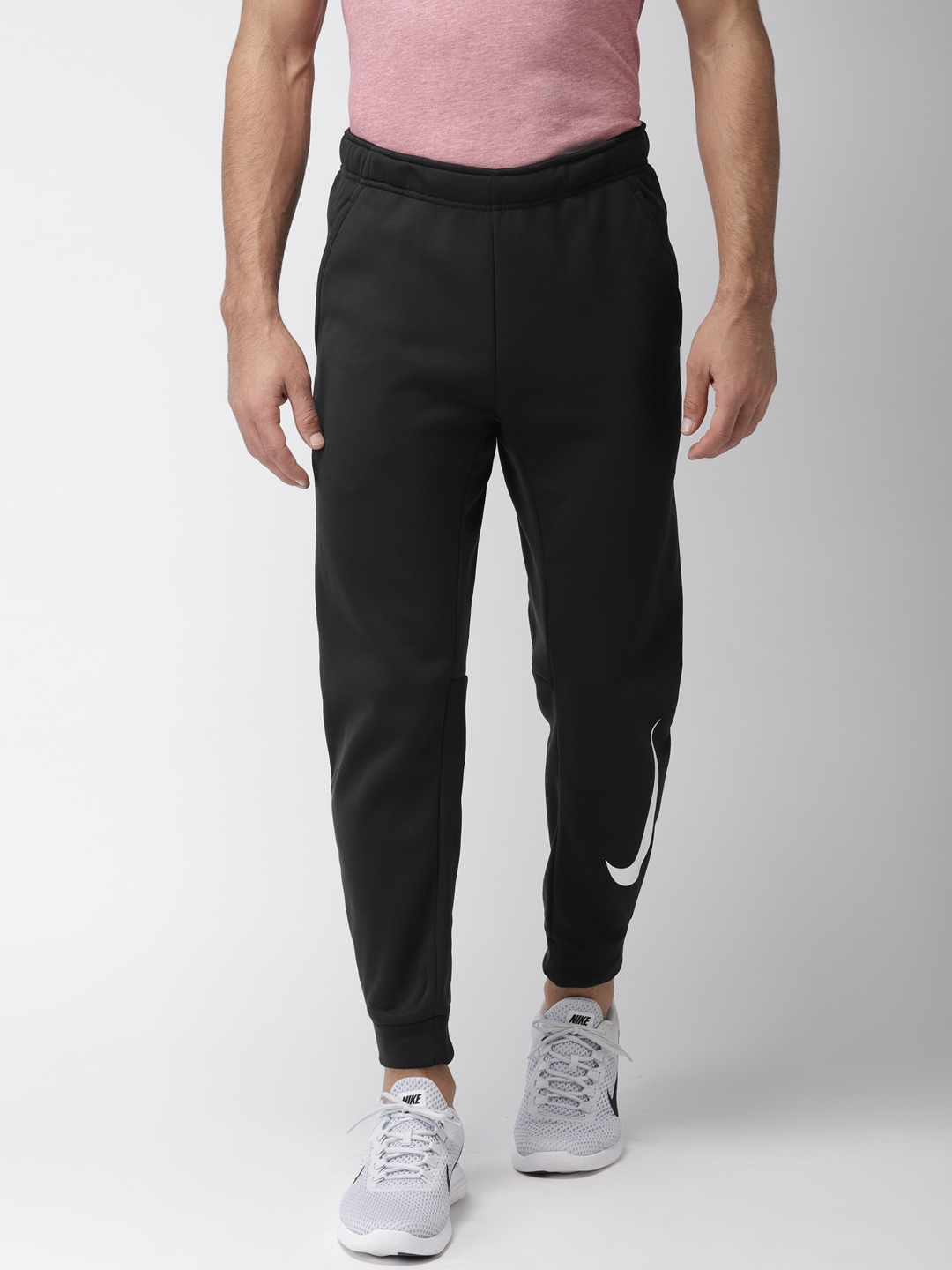 Buy Nike Men Black Solid Standard Fit THERMA PANT TPR SWOOSH Joggers ...
