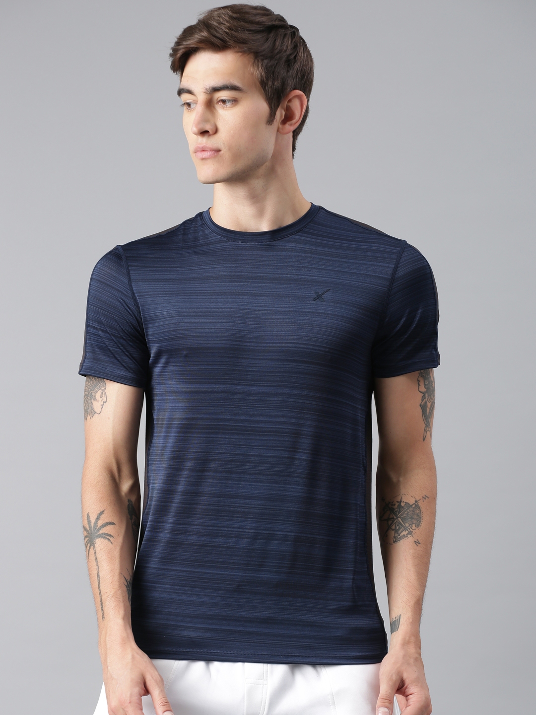 Buy HRX By Hrithik Roshan Men Navy Blue Solid Round Neck T Shirt ...