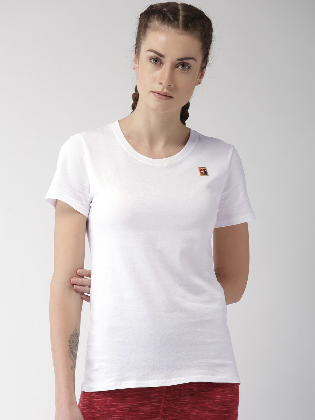Buy Nike Women White Solid HERITAGE Pure Cotton T Shirt Tshirts for