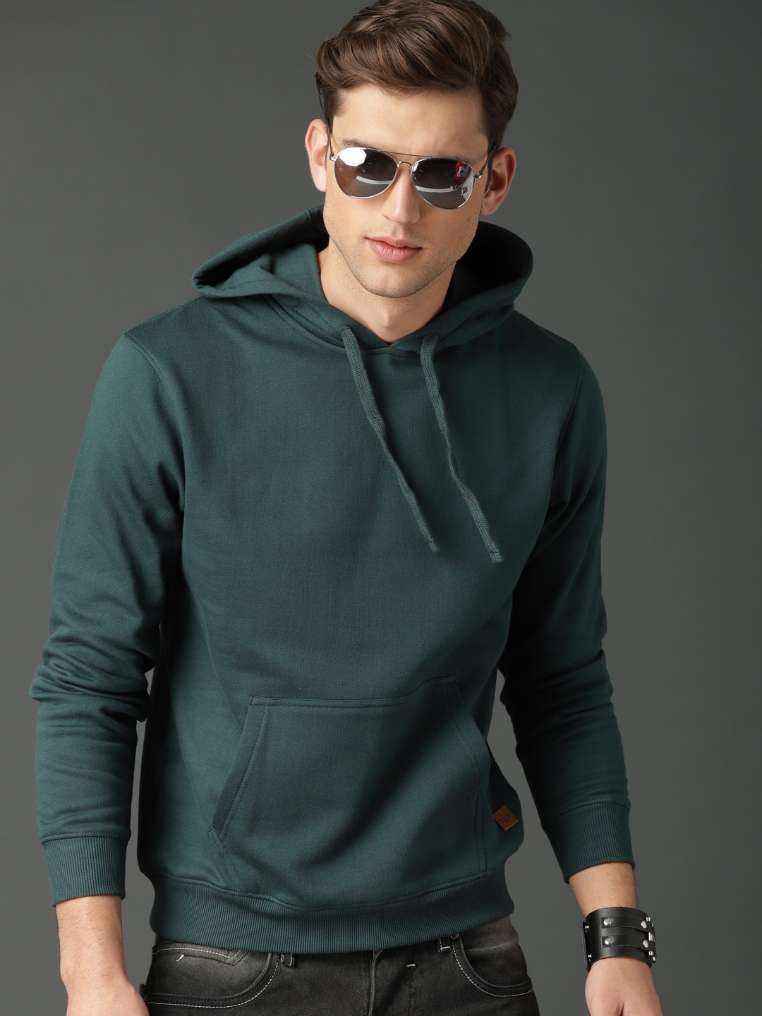 Buy Roadster Men Green Solid Hooded Sweatshirt - Sweatshirts for Men ...
