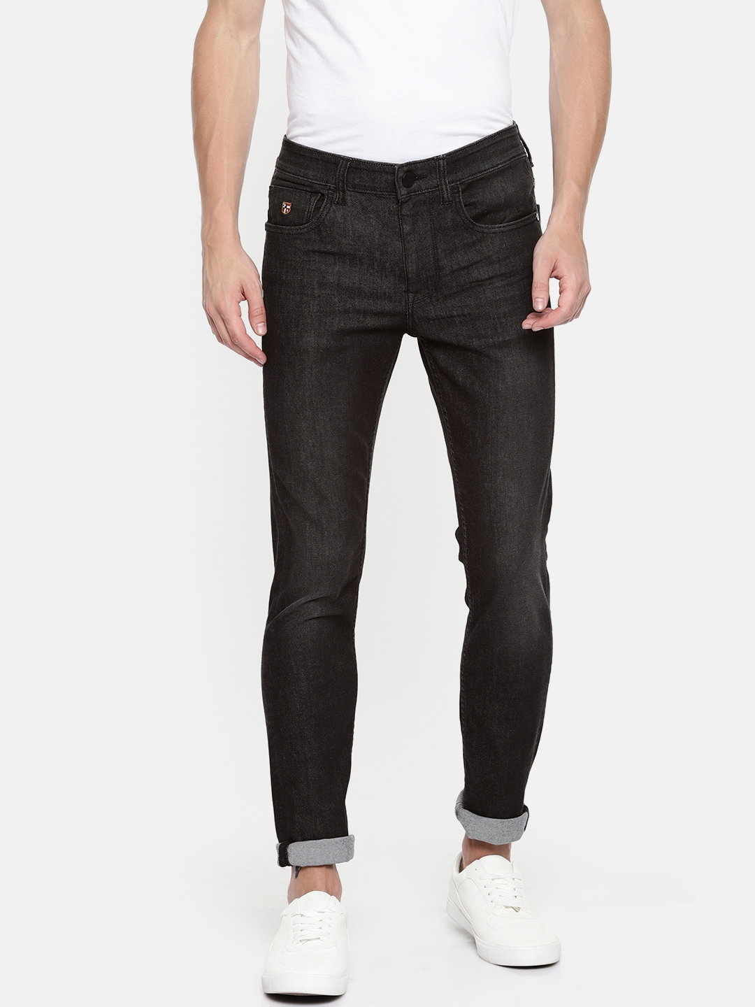 black polo and jeans