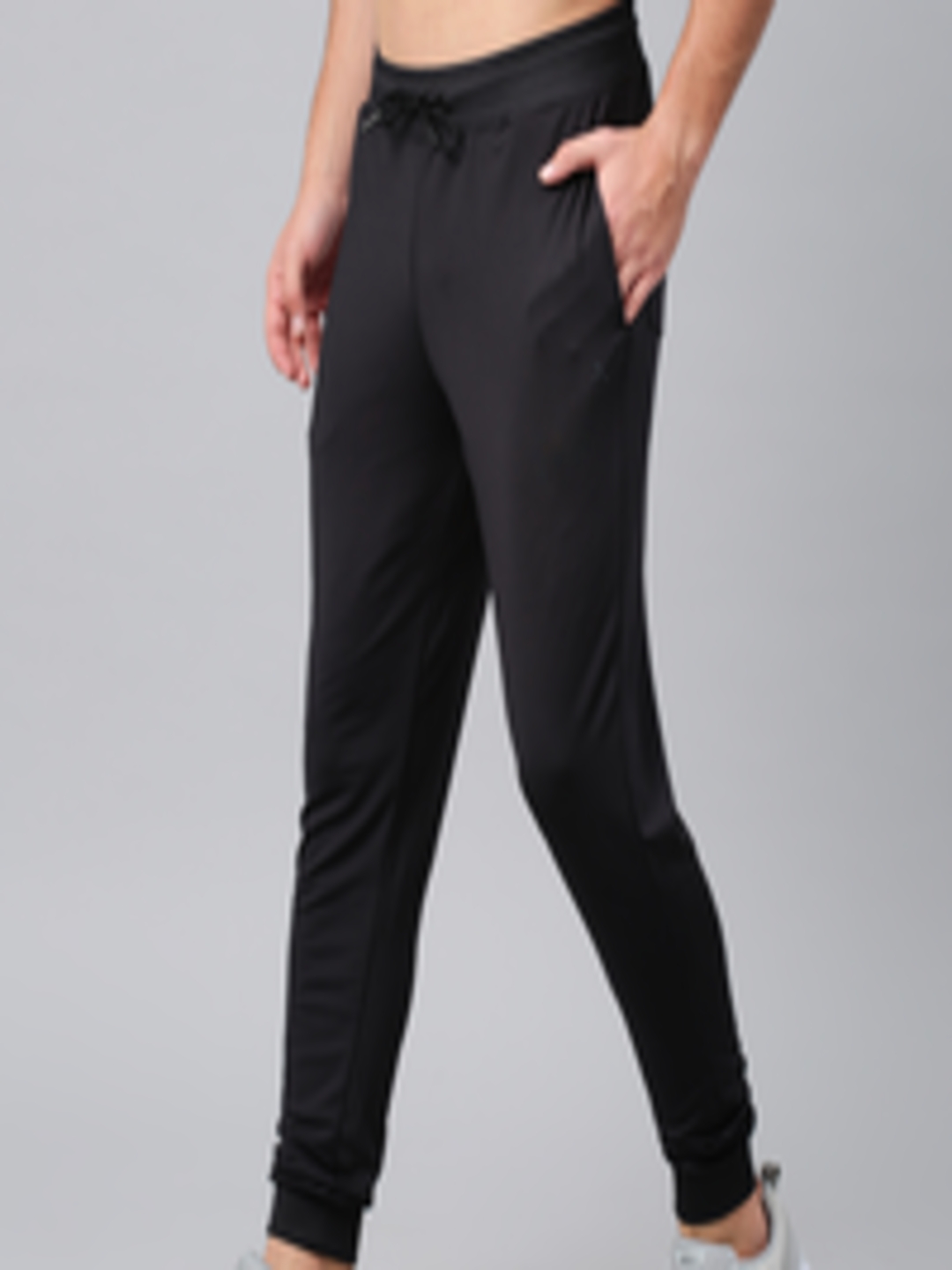 Buy HRX By Hrithik Roshan Men Black Solid Joggers - Track Pants for Men ...
