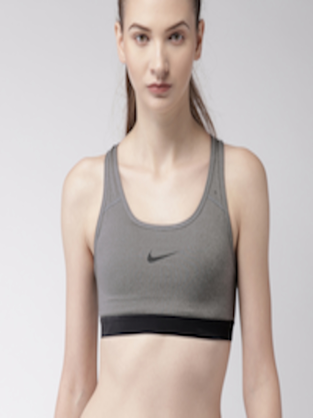 Buy Nike Women Grey Melange Solid Training Dri FIT Sports Bra 823313 ...