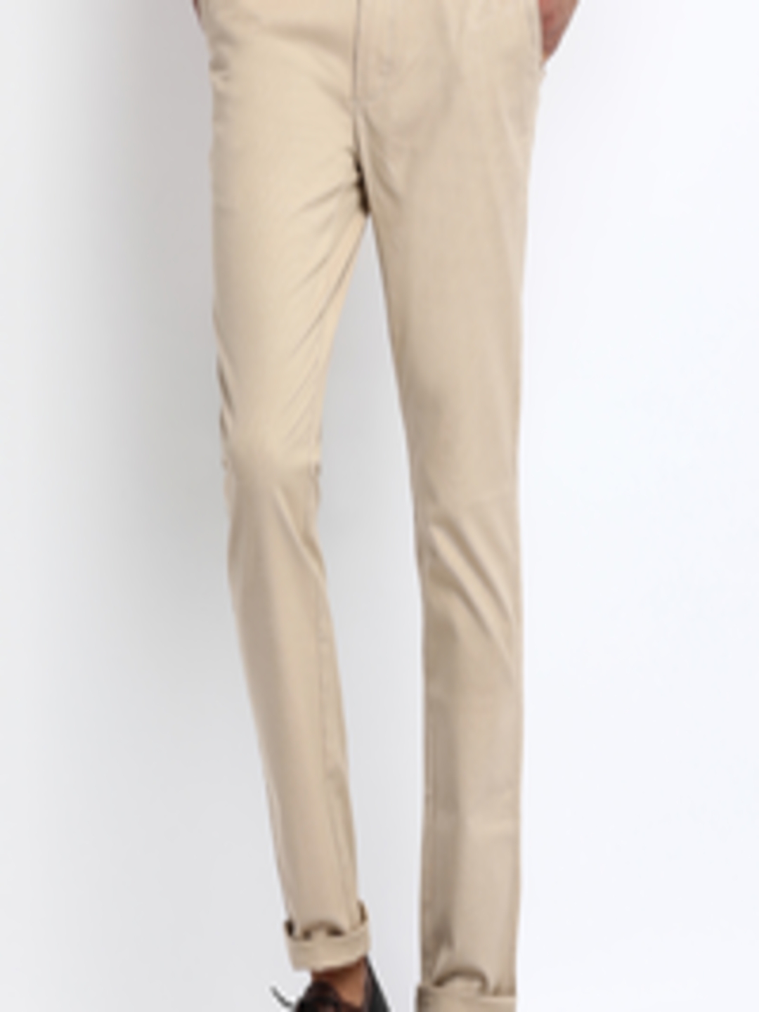 Buy Basics Men Beige Tapered Fit Self Design Chinos - Trousers for Men ...
