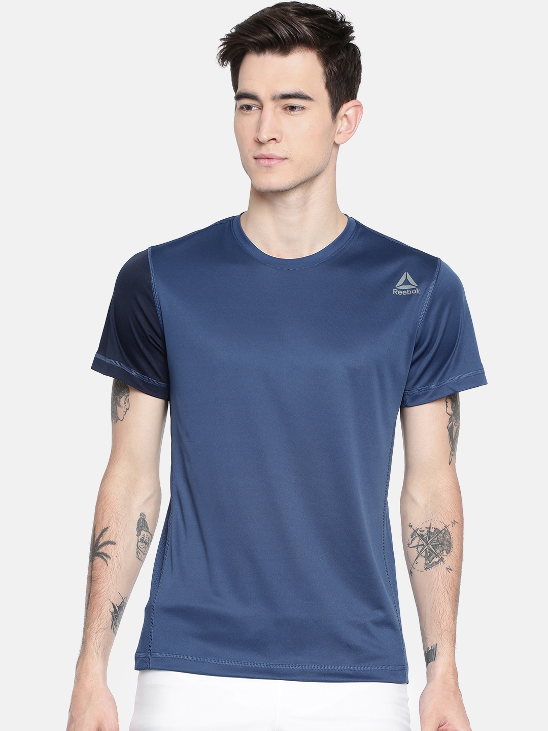 Buy Reebok Men Blue Solid CONTRAST POLY T Shirt - Tshirts for Men ...
