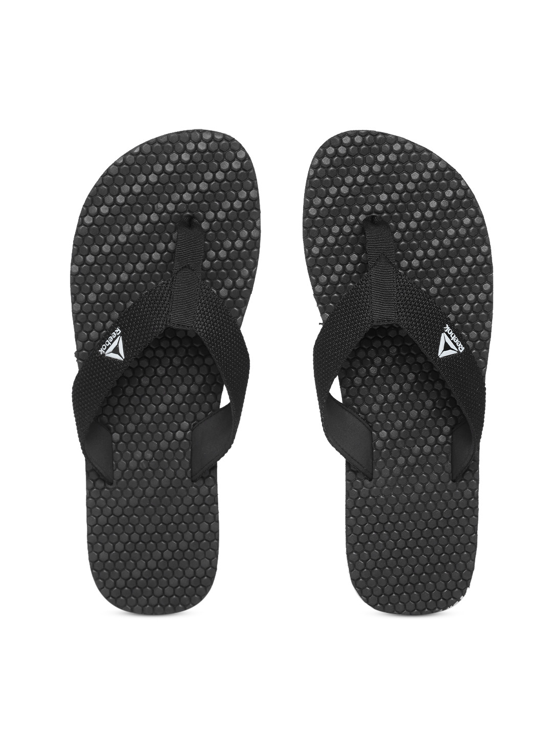 Buy Reebok Men Black Textured Thong Flip Flops - Flip Flops for Men 8497693 | Myntra