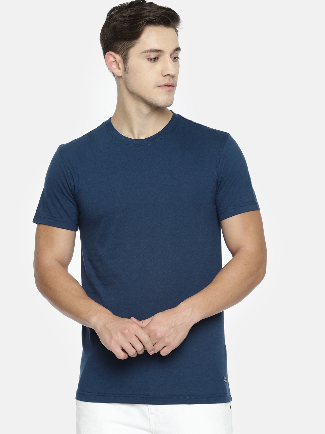 Buy Peter England Men Navy Blue Solid Round Neck T Shirt - Tshirts for ...