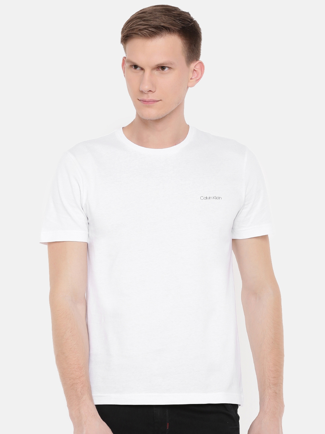Buy Calvin Klein Jeans Men White Solid Round Neck Pure Cotton T Shirt ...