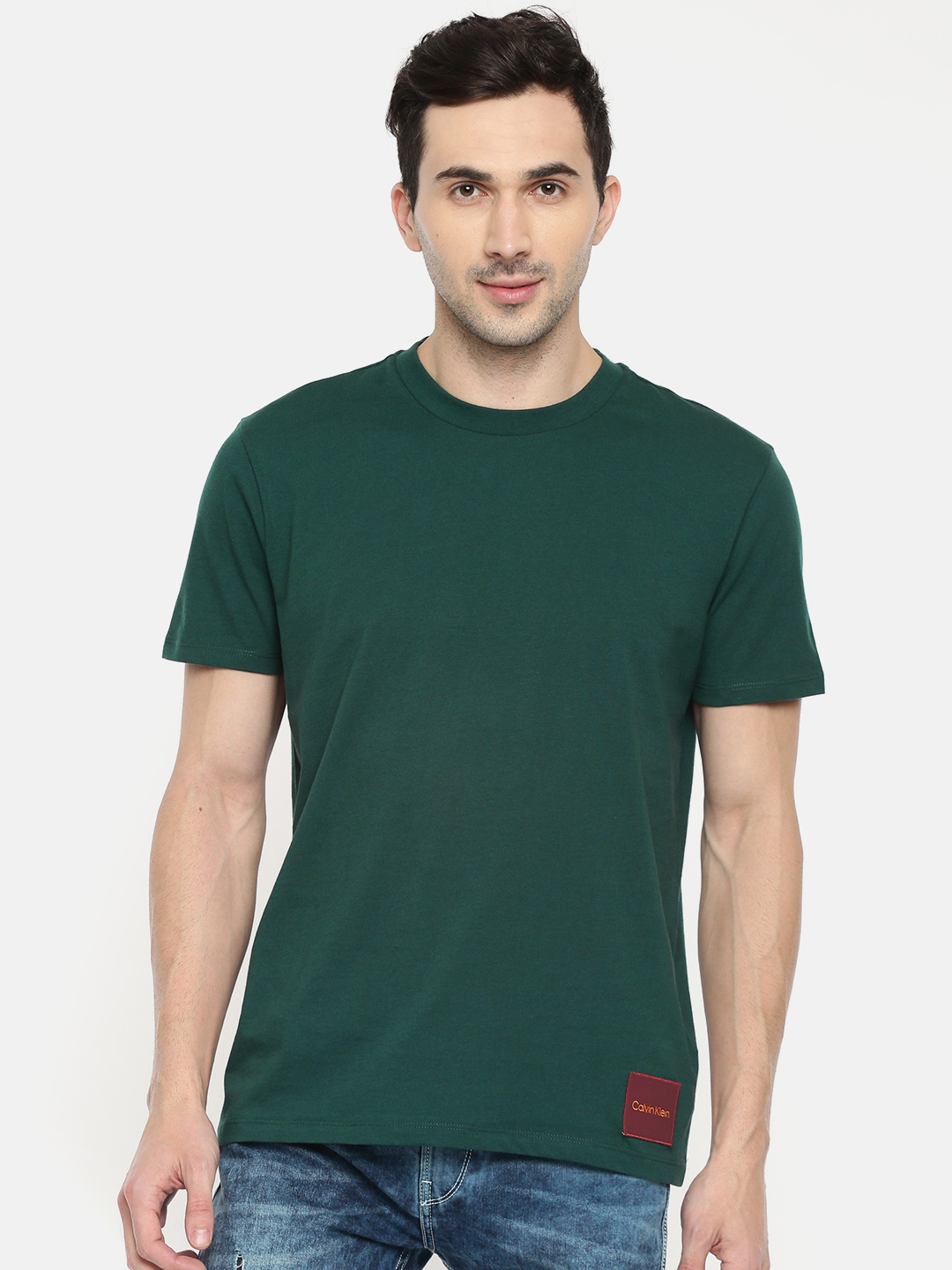 Buy Calvin Klein Jeans Men Green Solid Round Neck Pure Cotton T Shirt ...