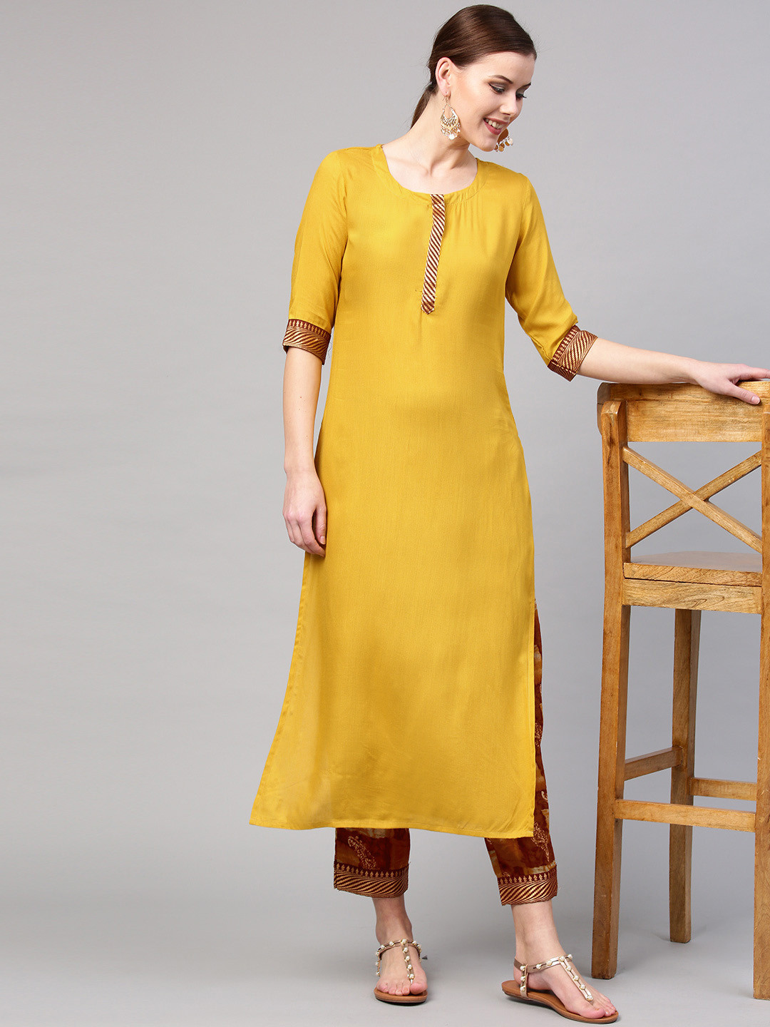Buy GERUA Women Mustard Yellow & Rust Brown Solid Kurta With Trousers