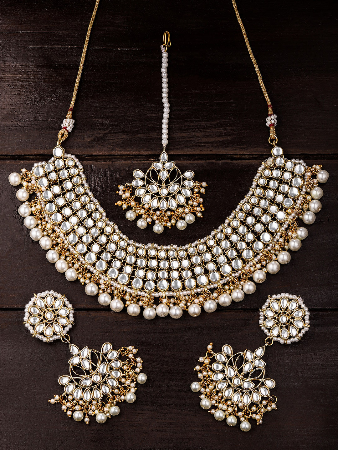 Buy Zaveri Pearls Gold Toned Kundan & Pearls Studded Jewellery Set