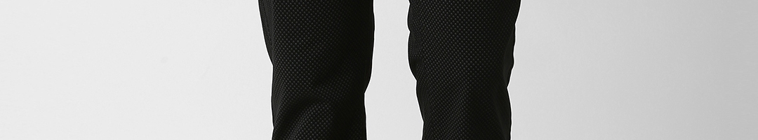 Buy Peter England Casuals Men Black Slim Fit Solid Regular Trousers ...