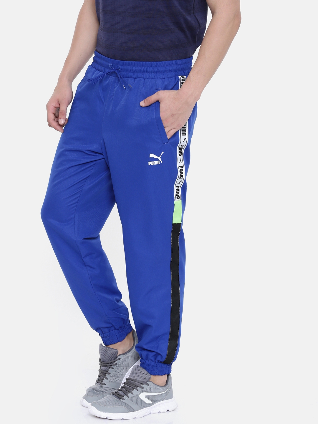 Buy Puma Men Blue Regular Fit Solid XTG Woven Joggers - Track Pants for ...
