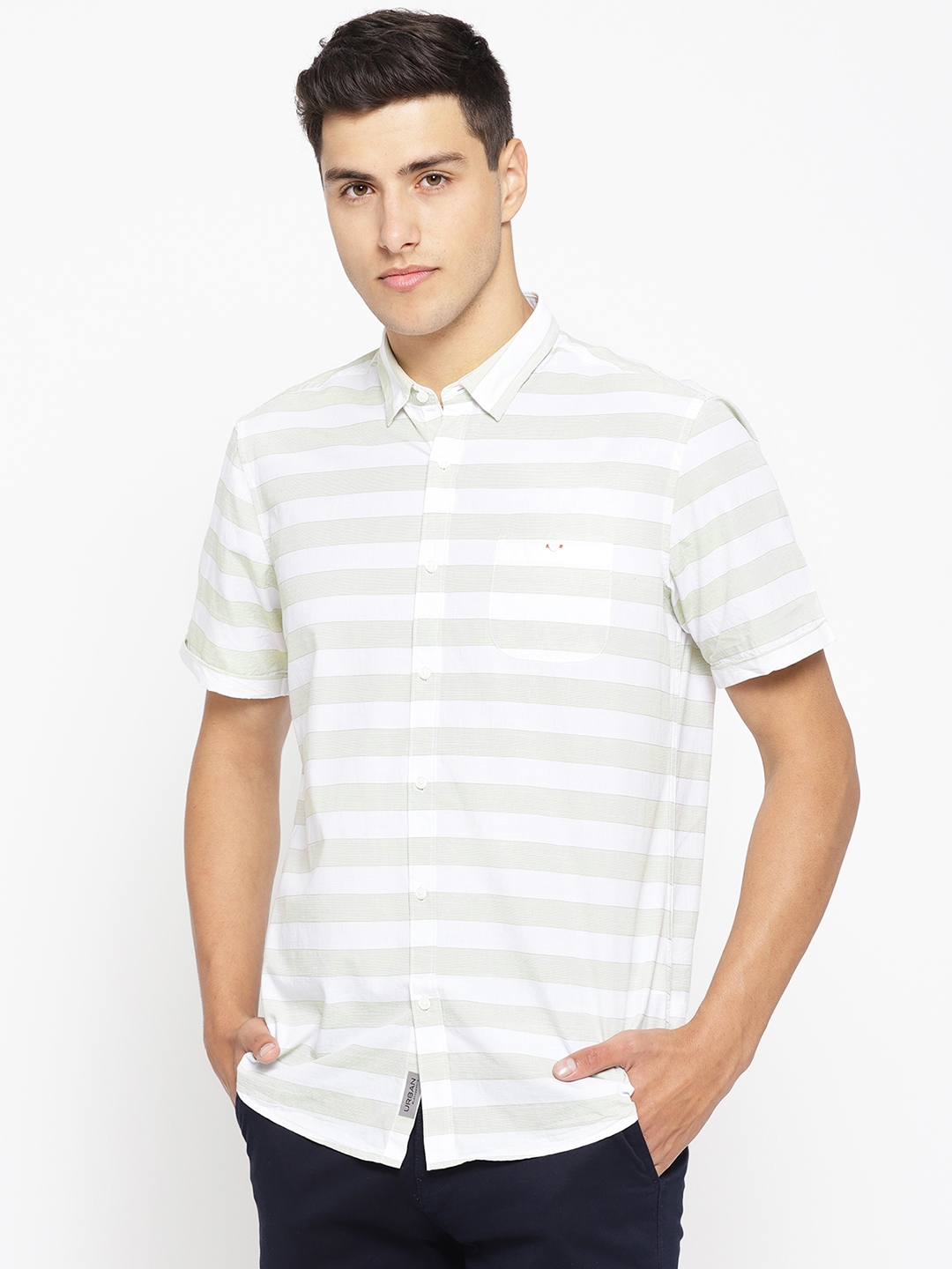 green strike off white shirt