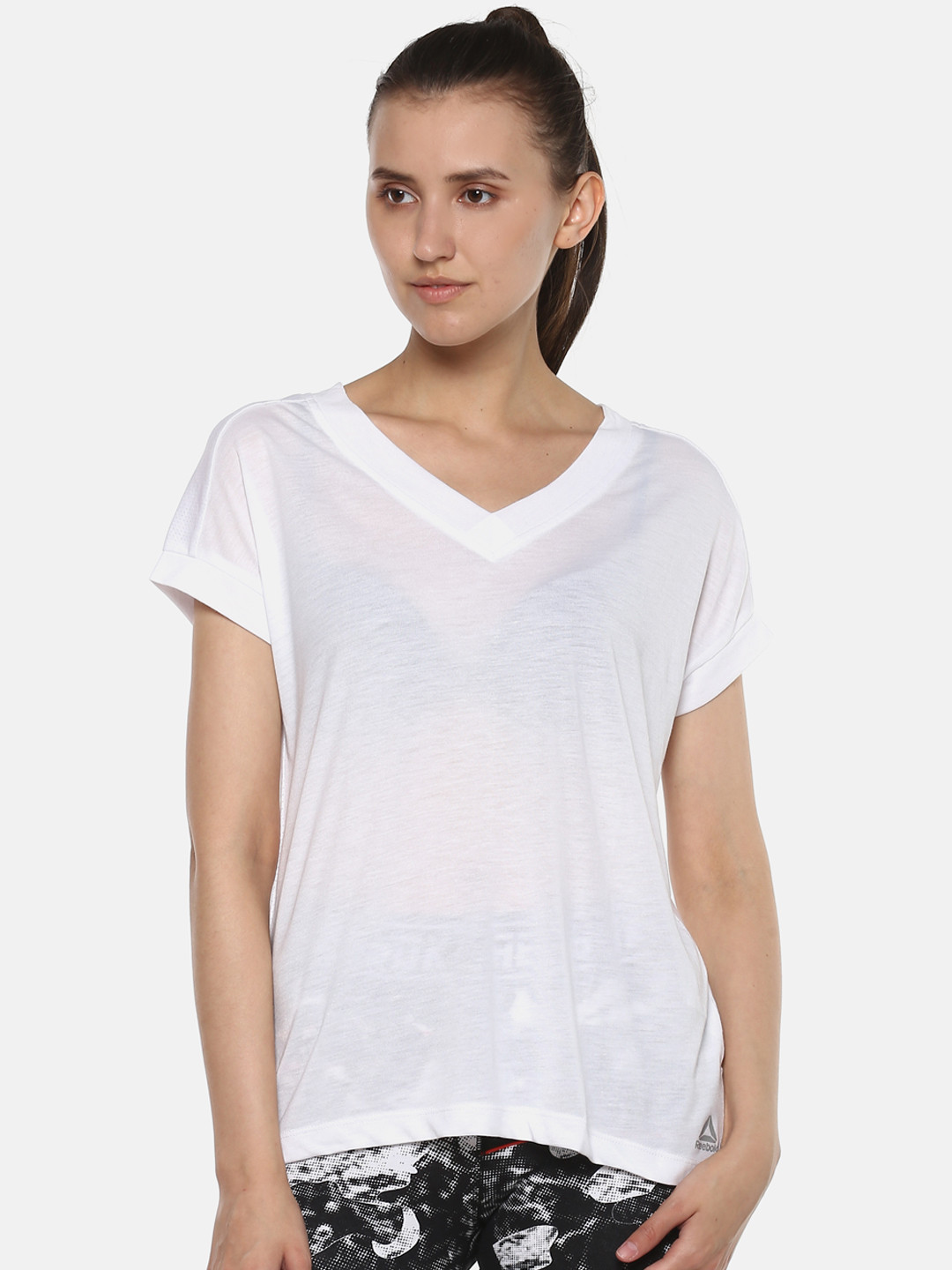 Buy Reebok Women White Solid WOR SUP Detail V Neck T Shirt Tshirts