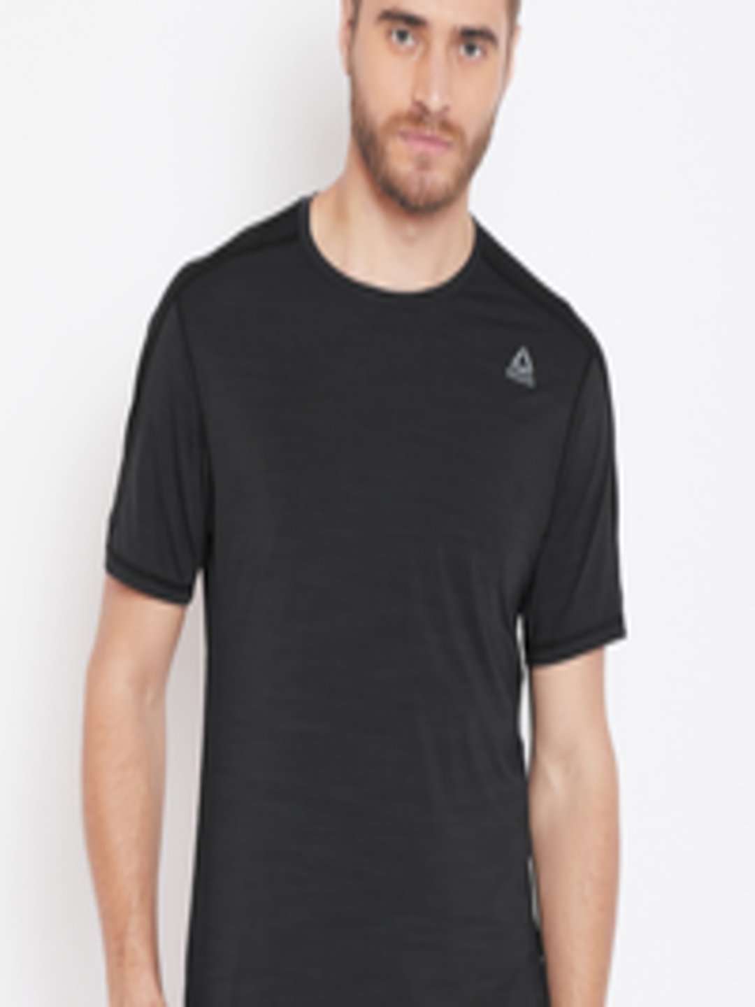 Buy Reebok Men Black Solid Slim Fit Training Activchill Move T Shirt ...