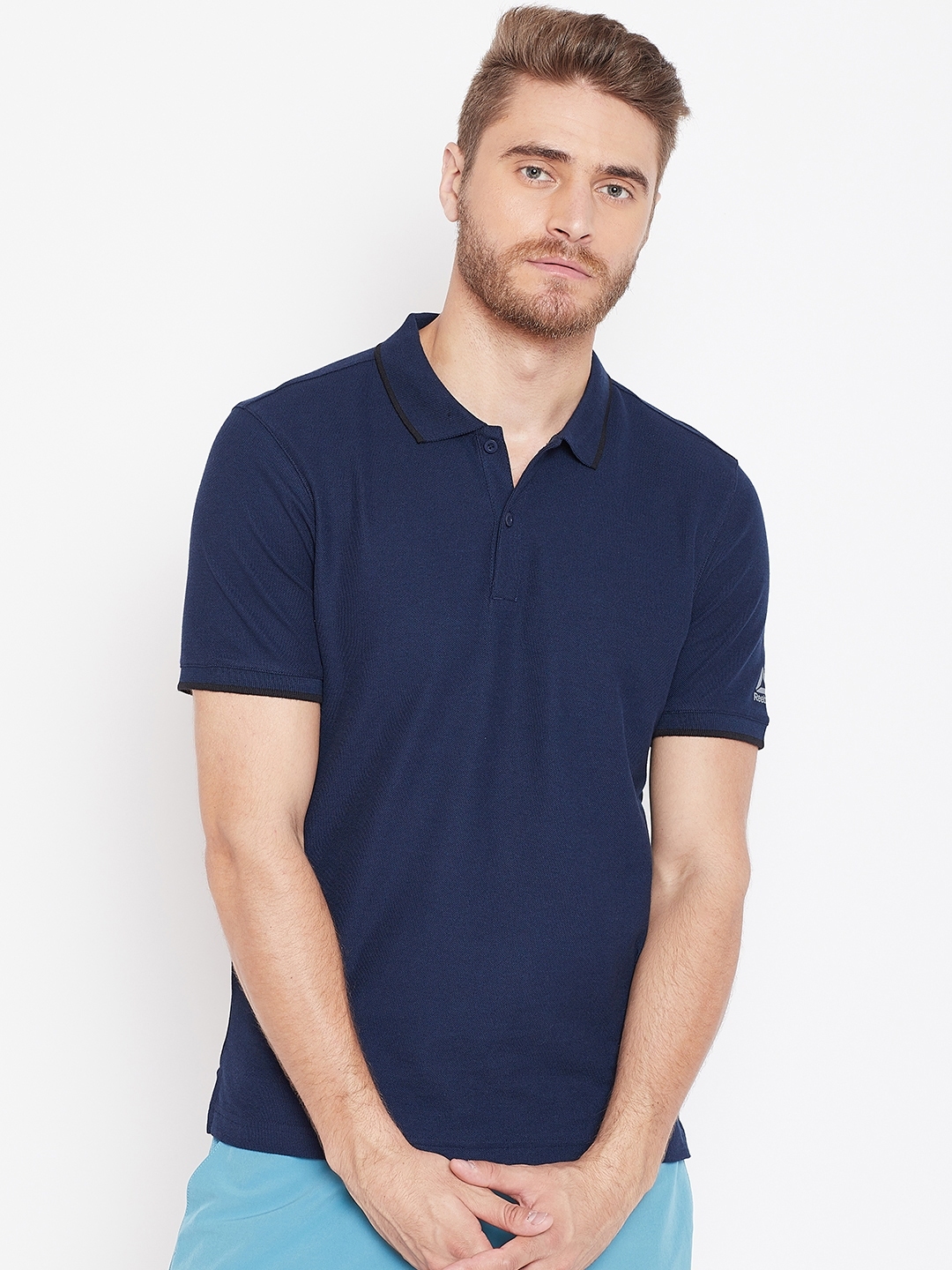 Buy Reebok Men Navy Blue Solid Polo Neck T Shirt - Tshirts for Men ...