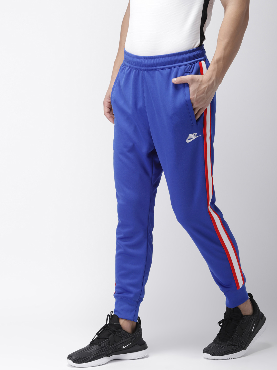 Buy Nike Men Blue Solid HE JGGR TRIBUTE Dri FIT Joggers - Track Pants for Men 9084213 | Myntra