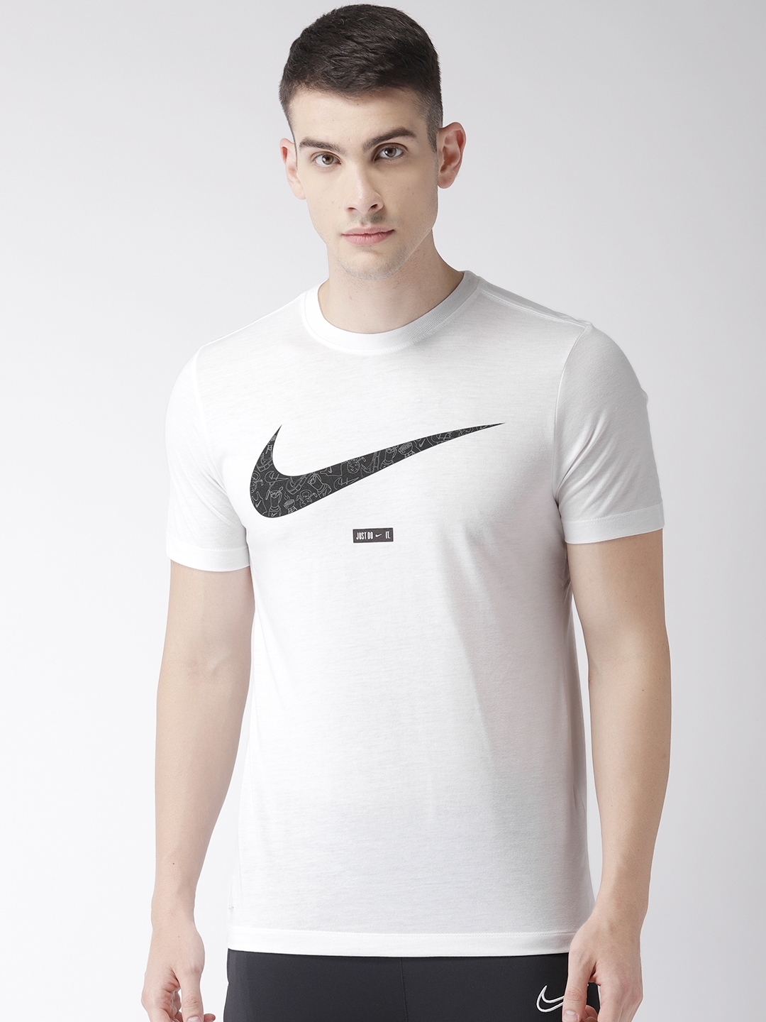 Buy Nike Men White Printed Standard Fit SWOOSH FUN SSNL T Shirt ...