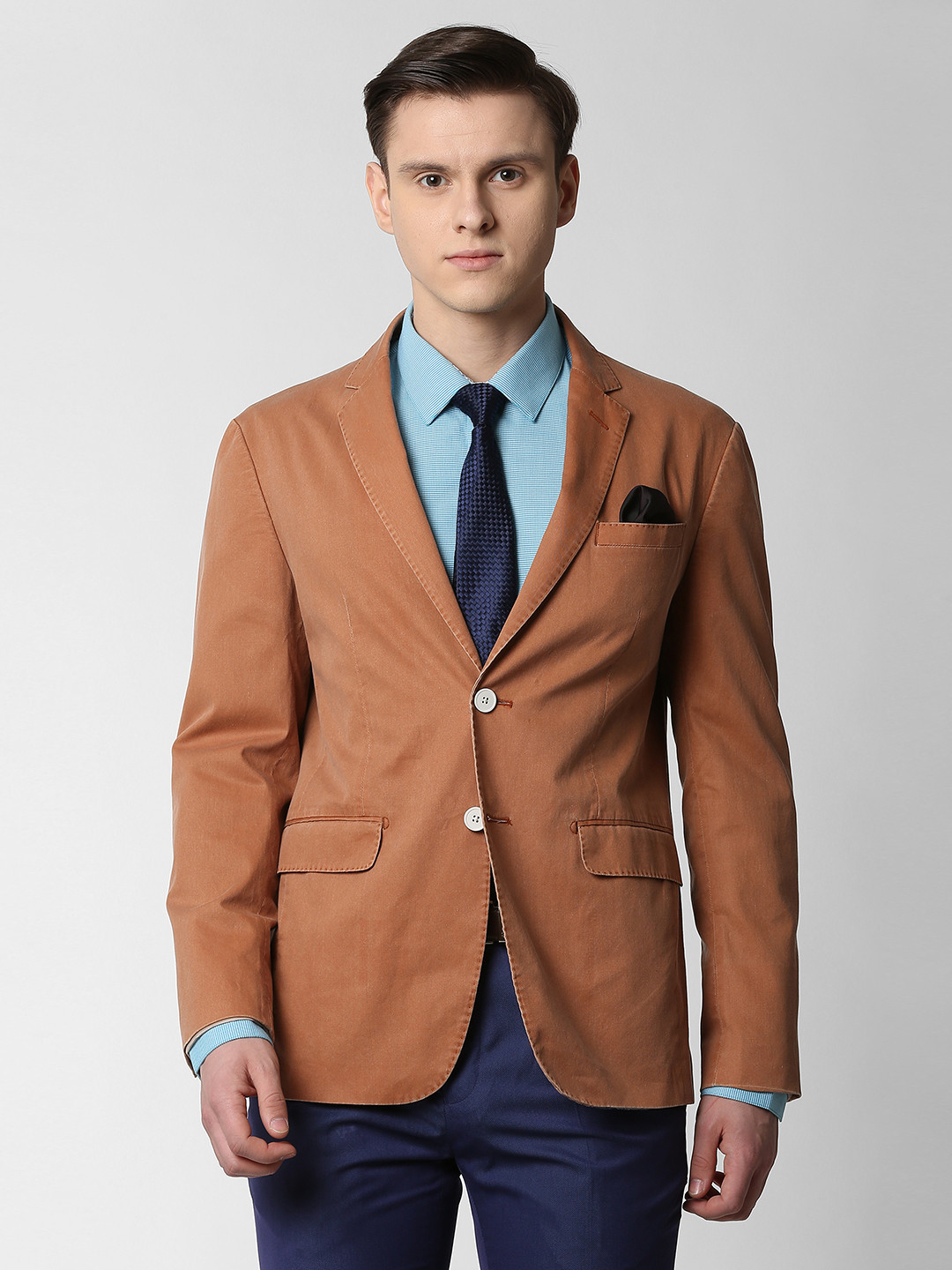 Buy Peter England Elite Men Rust Solid Slim Fit Single Breasted Pure