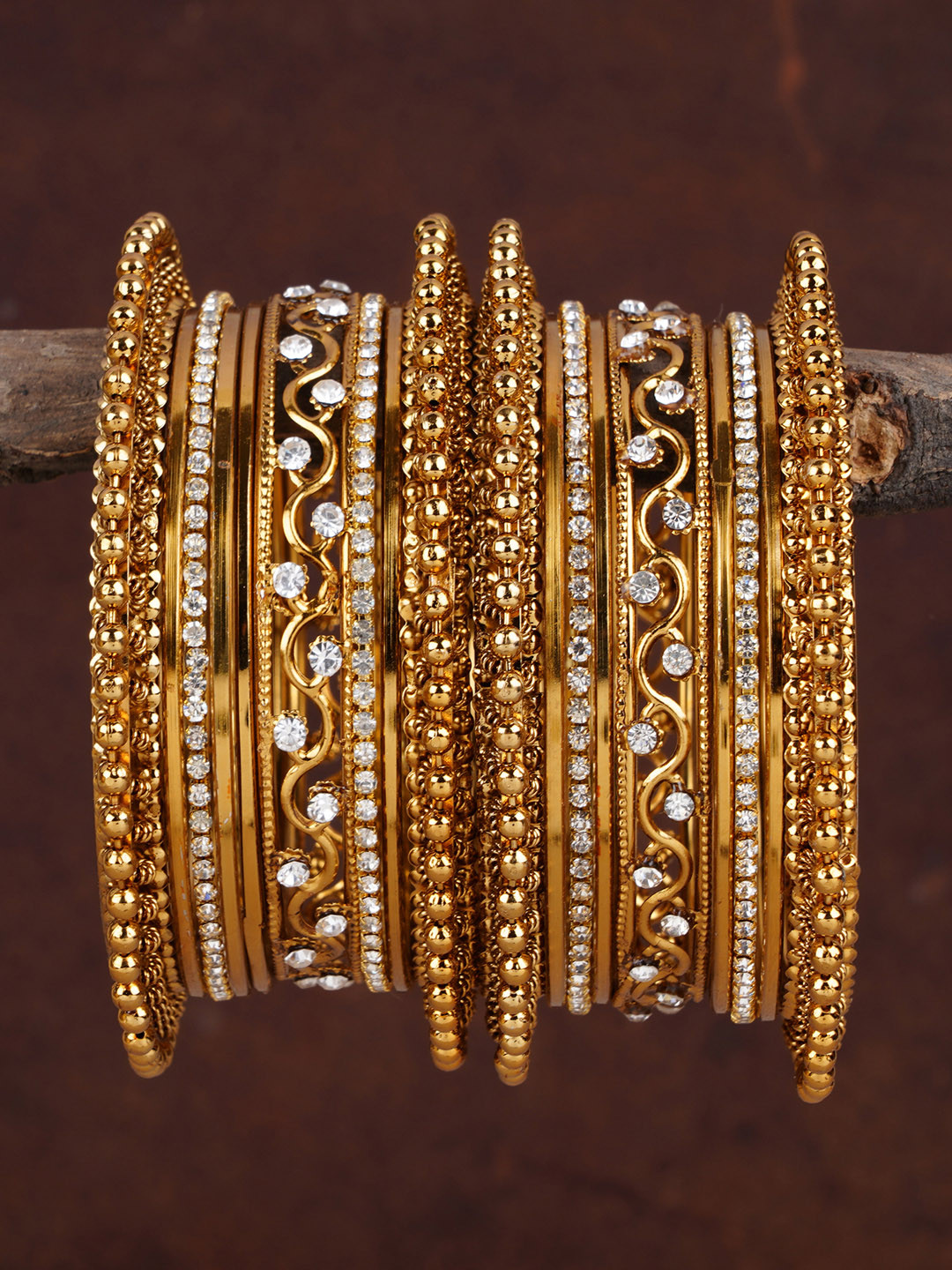 Buy Shining Diva Set Of 18 Gold Plated Stone Studded Bangles - Bangle ...