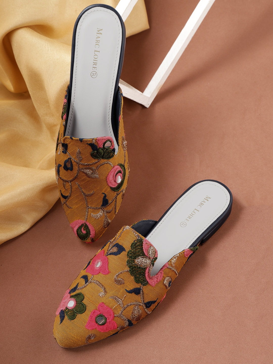 mustard mules flat