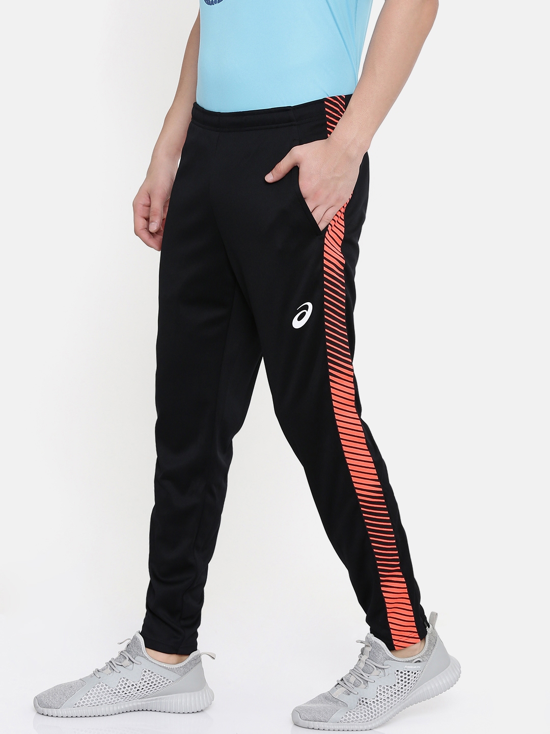 black and orange track pants