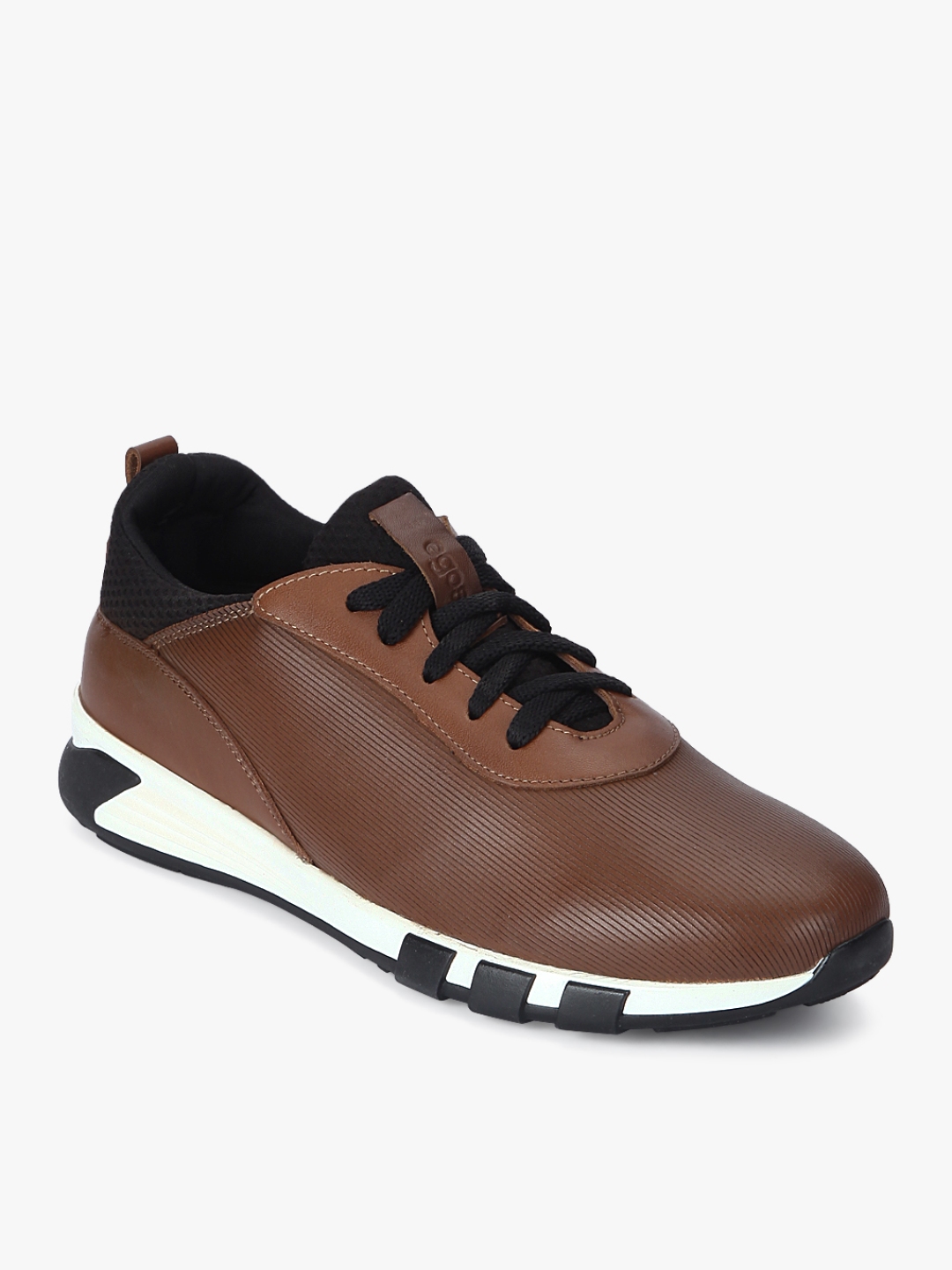 white and tan sneakers