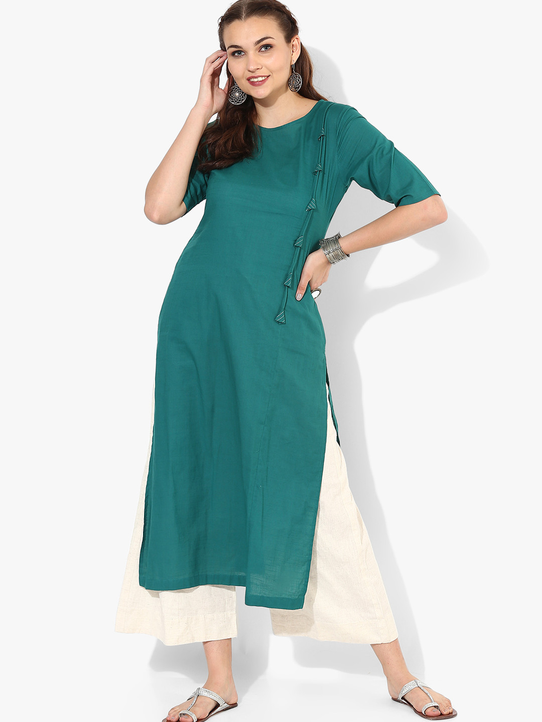 Buy Solid Round Neck Kurta With Tassels Detail And Elbow Length Sleeves
