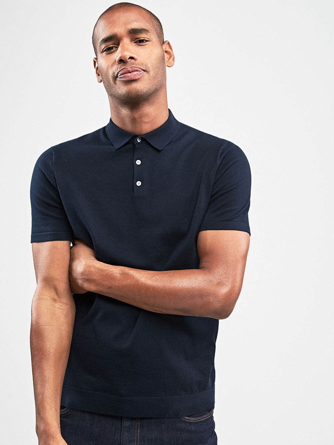 navy blue polo with black pants