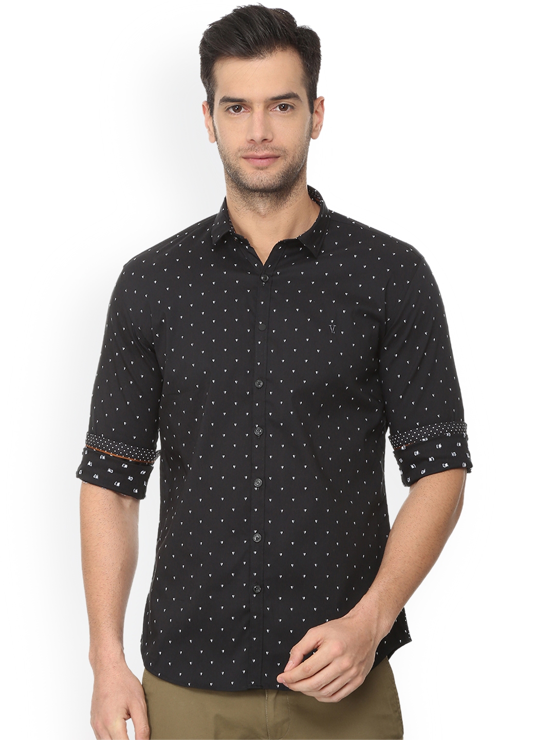 white and black dot shirt