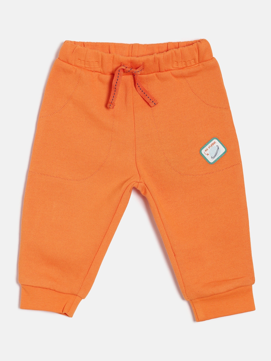 orange and white joggers