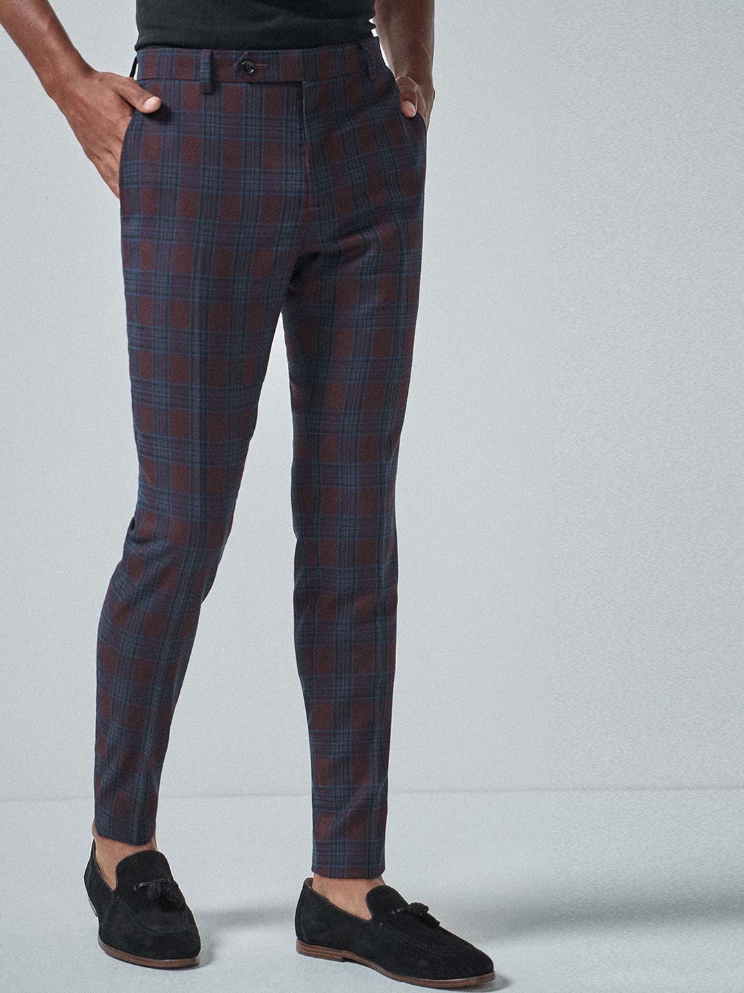 blue trousers with white stripe