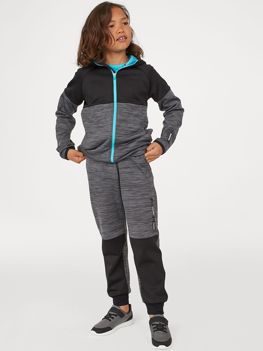 grey sports trousers