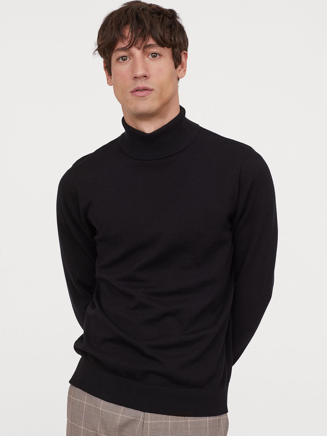 black knitted polo neck jumper