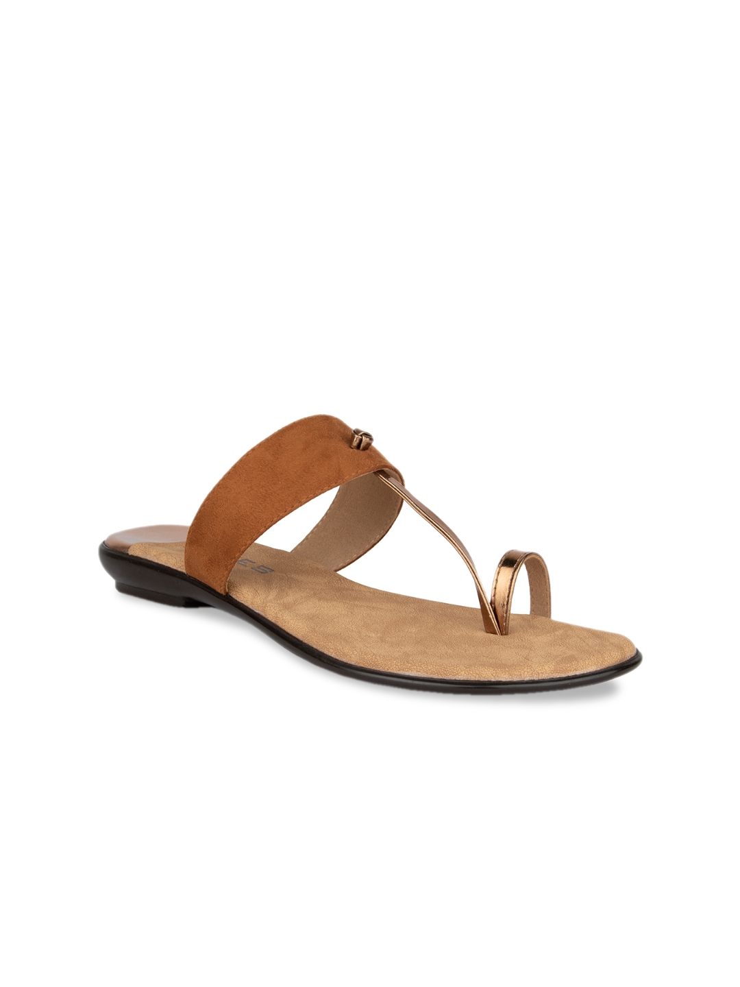 tan flats with black toe