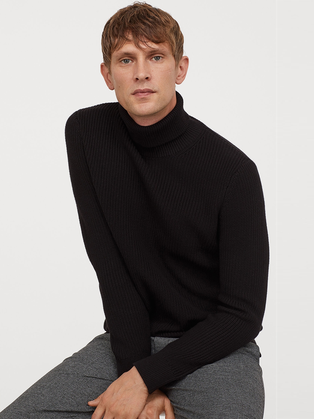 black knitted polo neck jumper