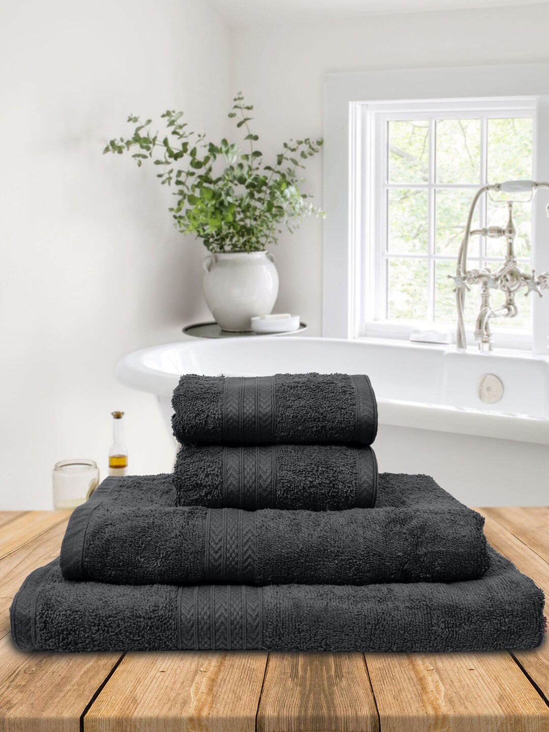 Buy BOMBAY DYEING Set Of 4 Charcoal Grey Solid 550 GSM Tulip Towels