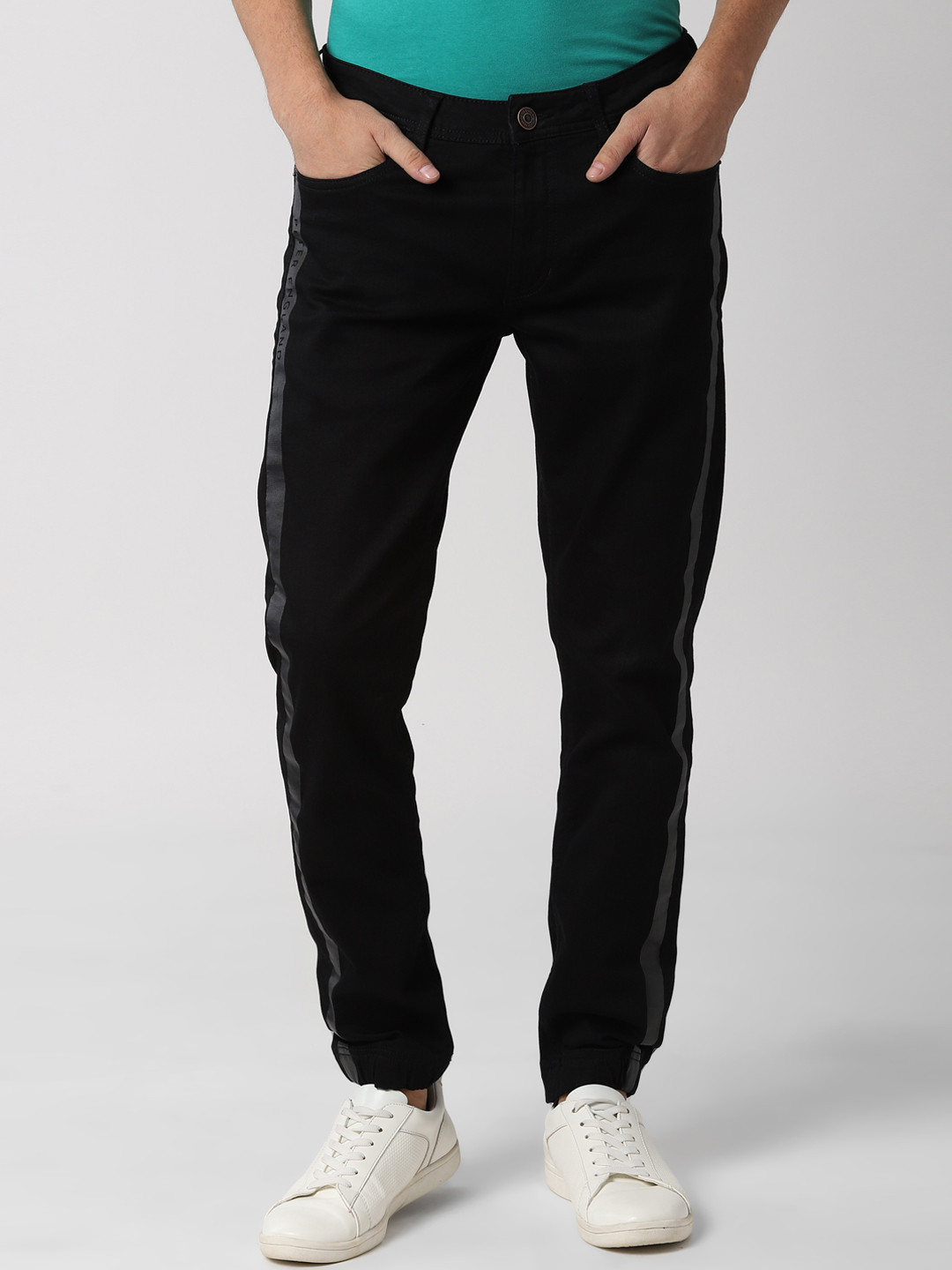 Buy Peter England Casuals Men Black Tapered Fit Mid Rise Clean Look Stretchable Jeans Jeans