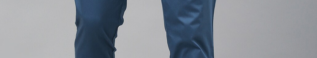 Buy RARE RABBIT Men Blue Solid Regular Trousers - Trousers for Men ...