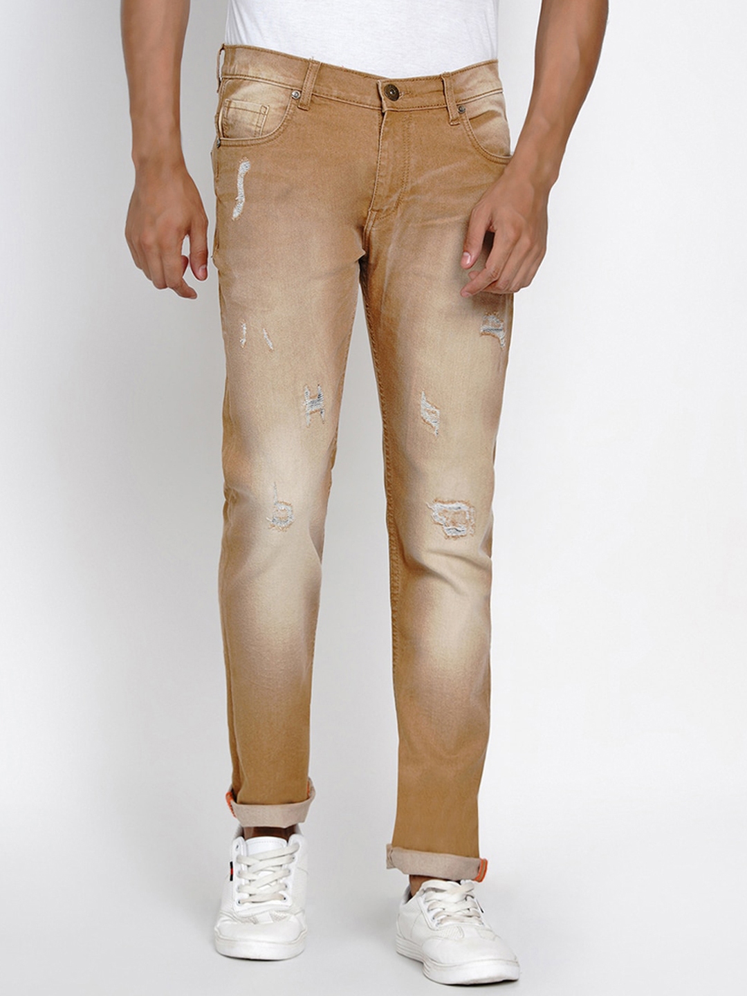 tan distressed jeans