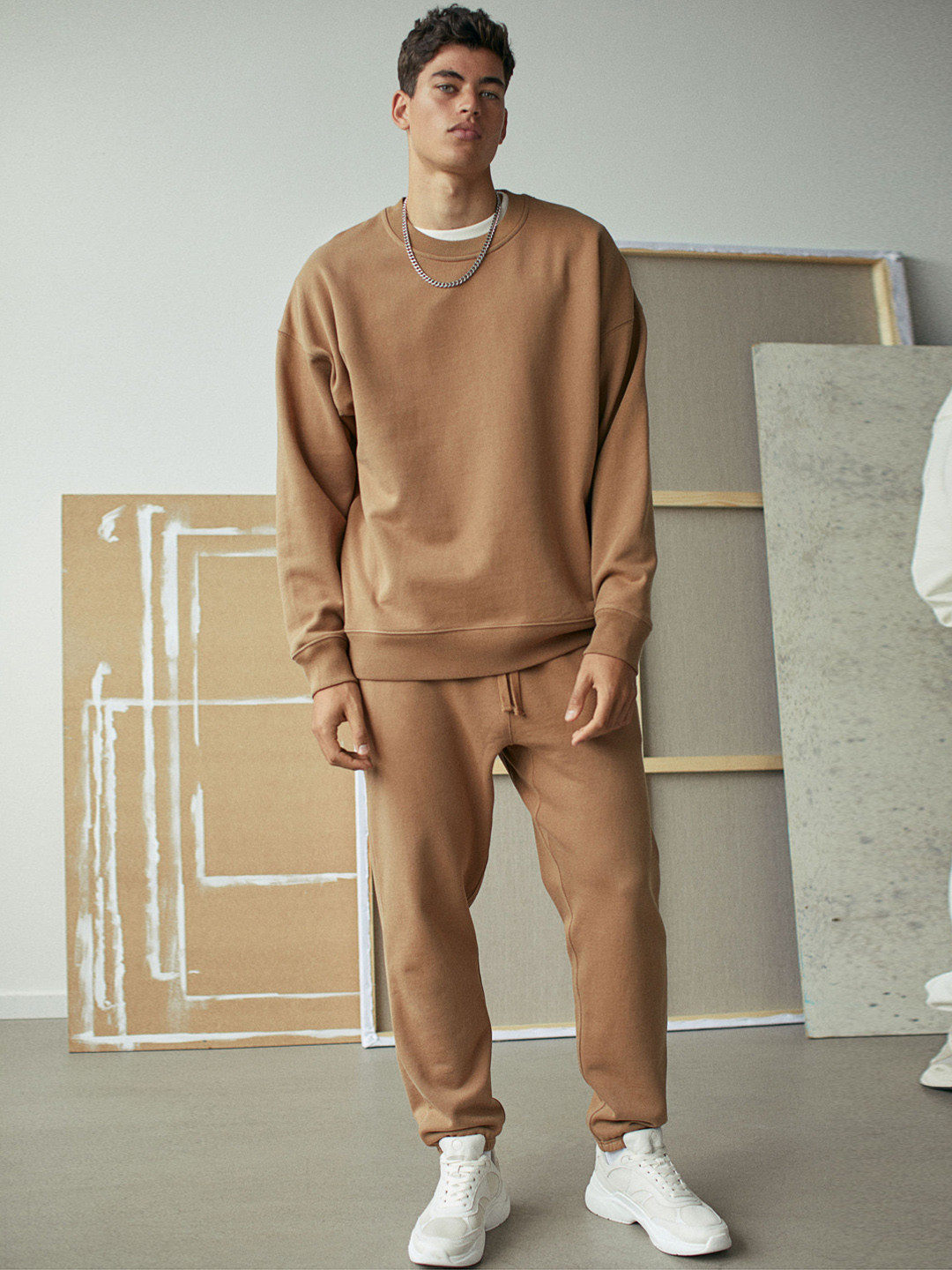 Buy H&M Men Beige Solid Cotton Joggers - Trousers for Men 12427316 | Myntra