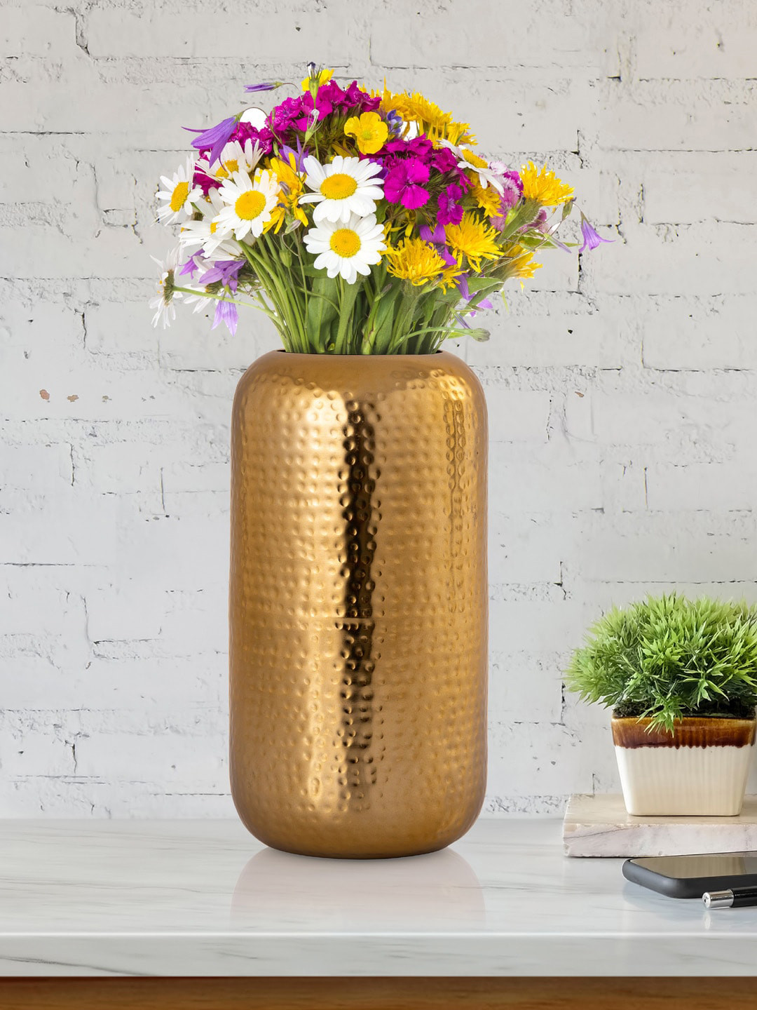 Buy Aapno Rajasthan Gold Toned Solid Shiny Hammered Cylindrical Flower