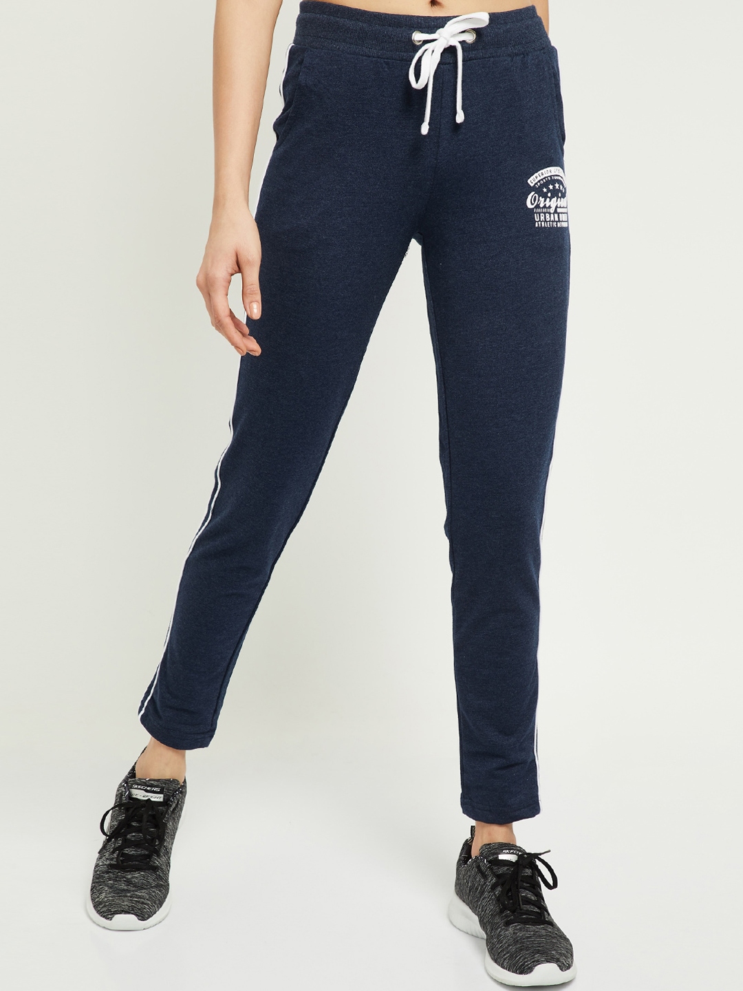 navy blue and white track pants