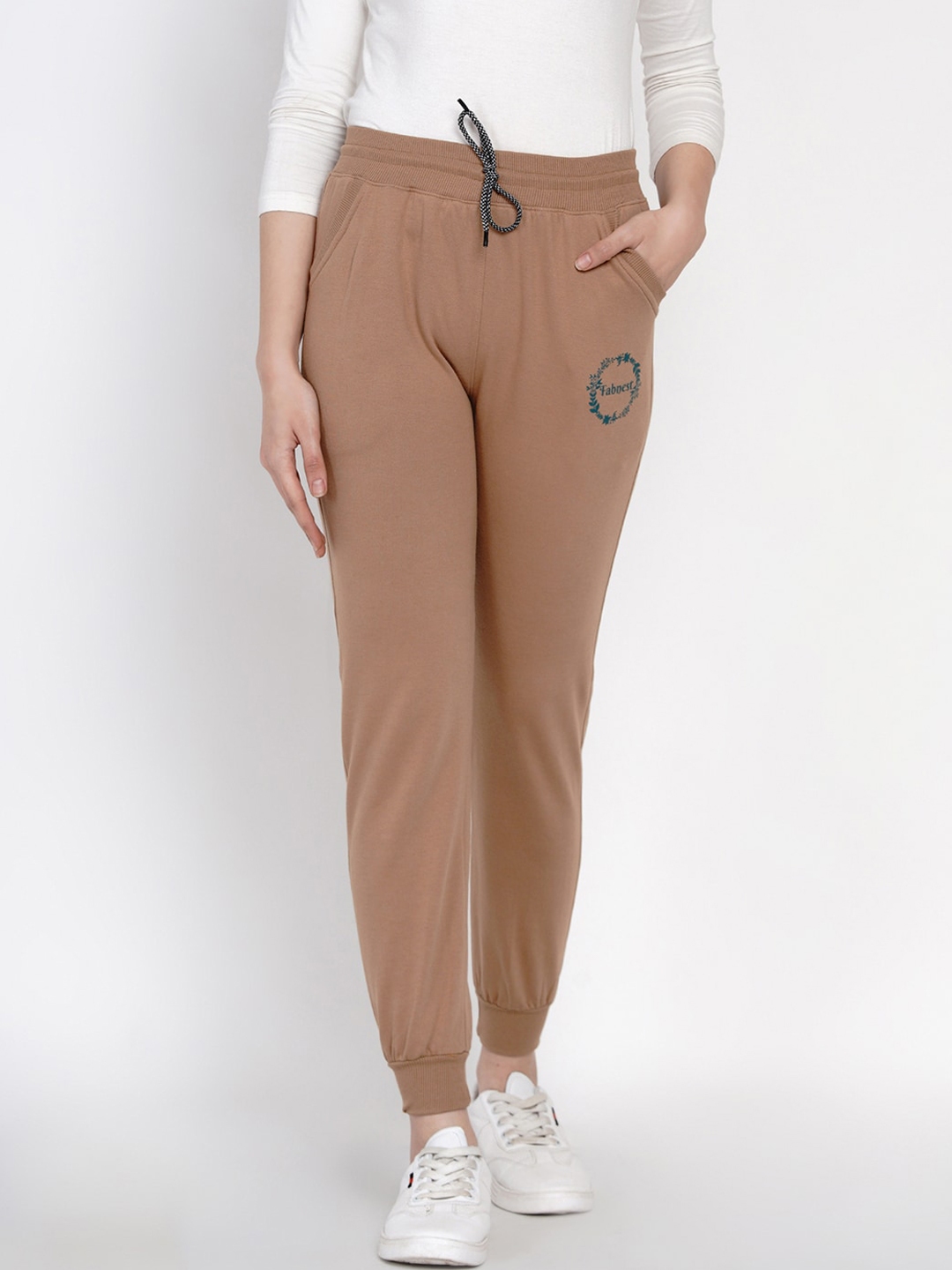 beige track pants